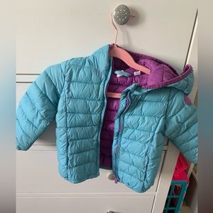 Baby gap teal puffer jacket with purple interior. Has pockets and hoodie.
